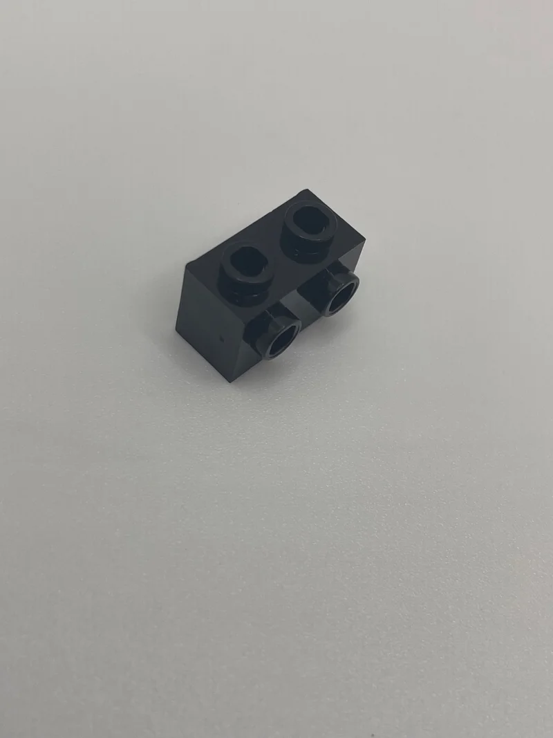 Brick Modified 1 x 2 with side studs in Black