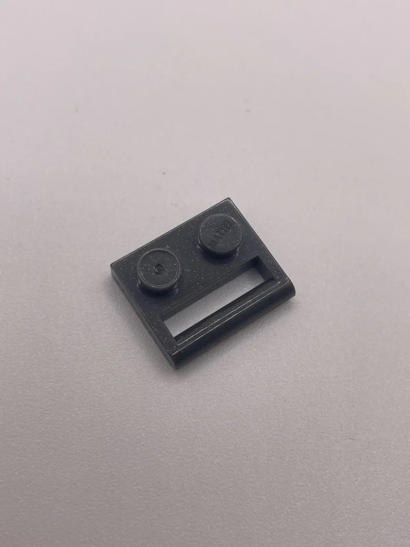 Plate Modified 1 x 2 with enclosed handle, lengthwise in Gray, Dark (Metallic)