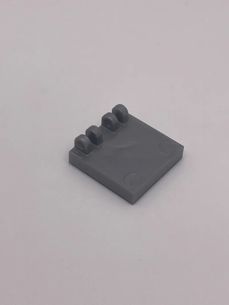 Hinge Tile 2 x 2 w/ 4 Fingers in Gray, Light (Metallic)