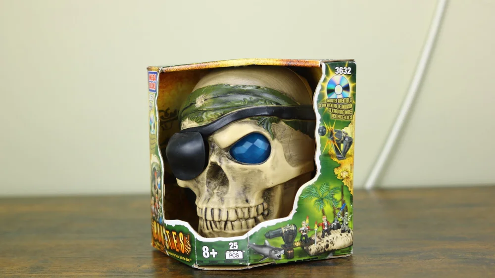 Miscellaneous: themed packaging, skull, front with green bandana