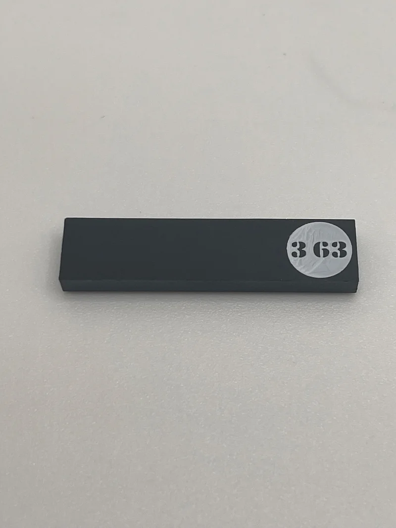Tile 1x4 w/ Printed 363 - Right in Black