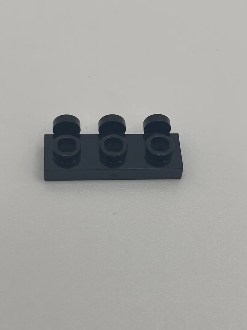Plate 1 x 3 with three studs on side, ascending in Black