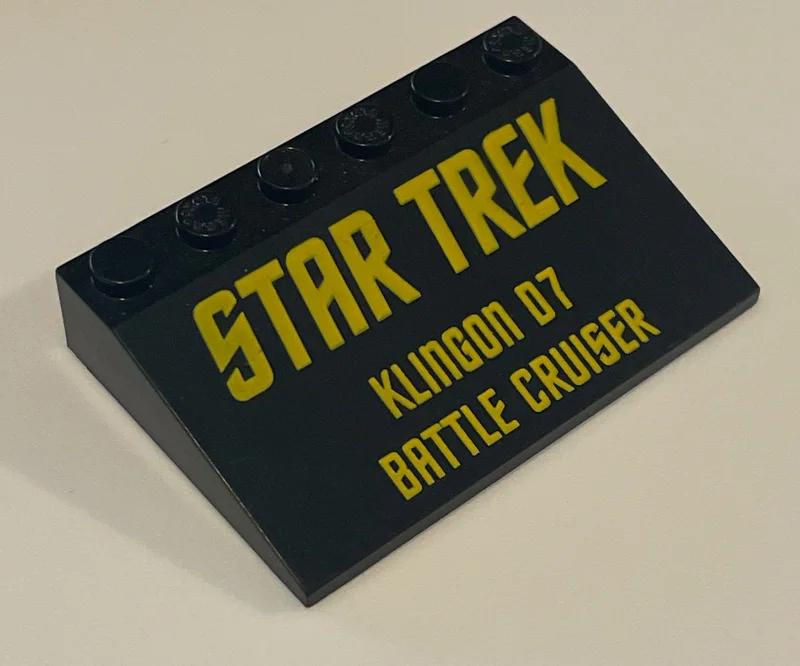 Slope 25 4 x 6 printed with ''Klingon D7 Battle Cruiser'' in Black