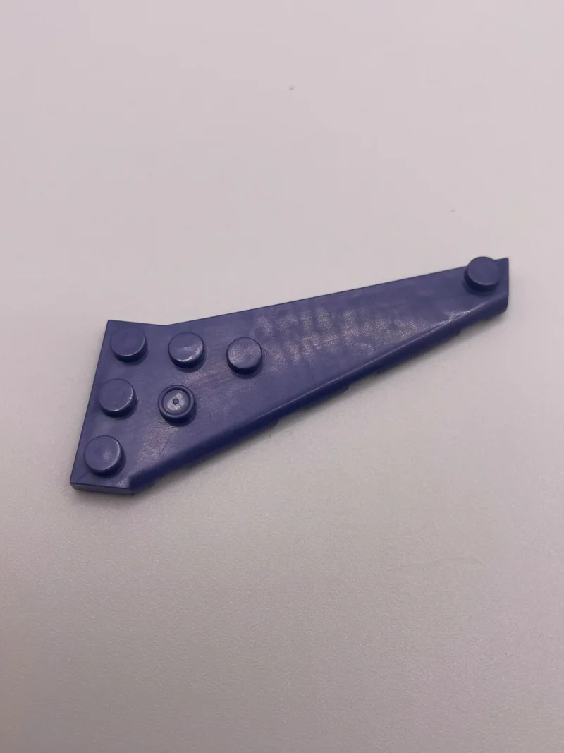 Wing 3 x 8 sharply back-swept with rounded leading edge, left in Purple, Rich