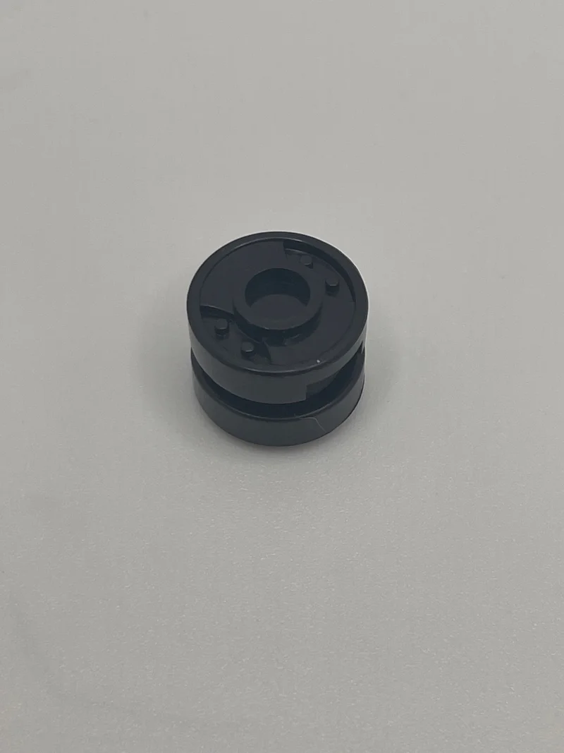 Wheel, Small: rim with grooved tread mount and 10 lugs in Black