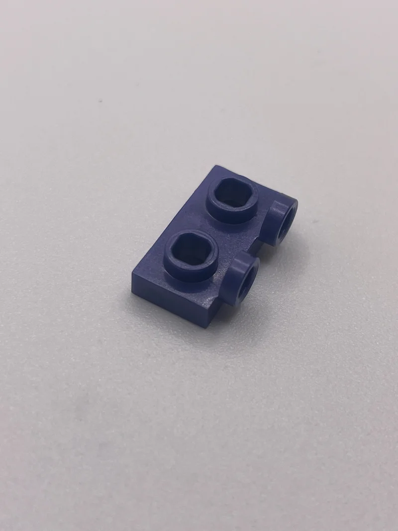 Bracket Plate 1 x 2 with two studs on side, ascending in Purple, Rich