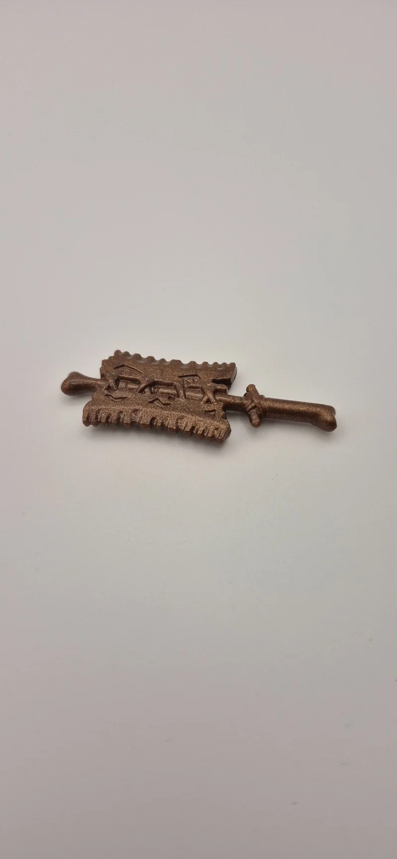 Weapon, Melee: club, toothed with rectangular head