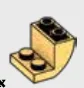Slope brick 45 2 x 2 inverse, curved in Gold, Burnt (Metallic)
