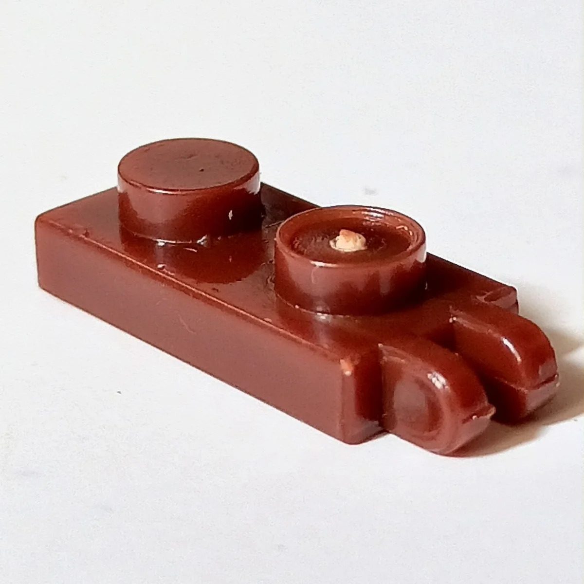 Hinge plate 1 x 2 with two fingers, locking in Brown, Reddish