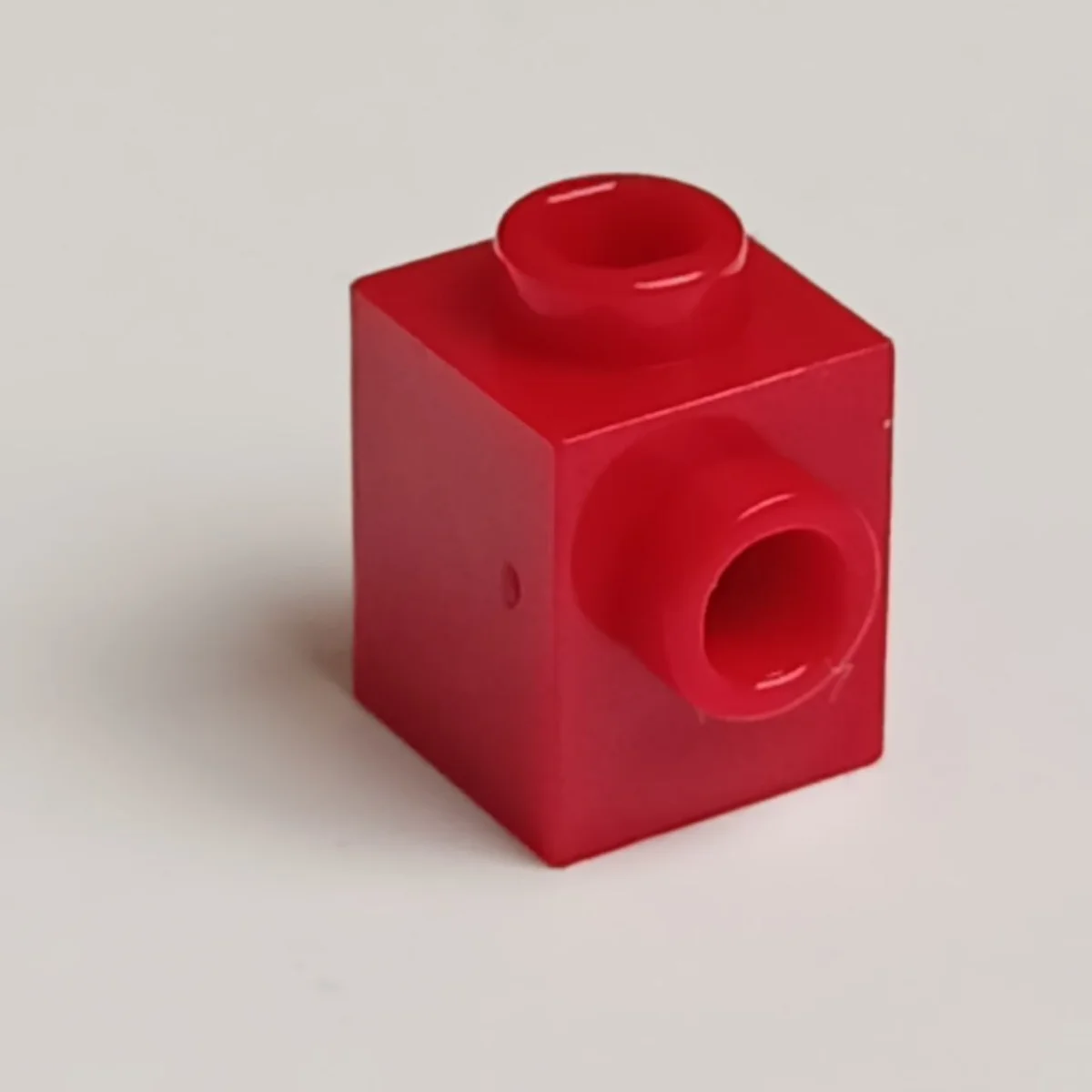 Brick Modified 1 x 1 with side stud in Red, Flame