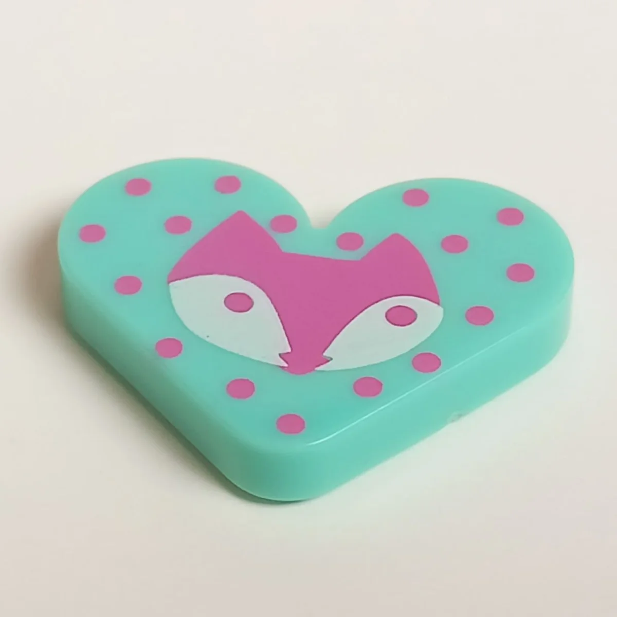 Tile 2 x 2 heart shaped with pink and white fox on a polka dot background pattern in Teal