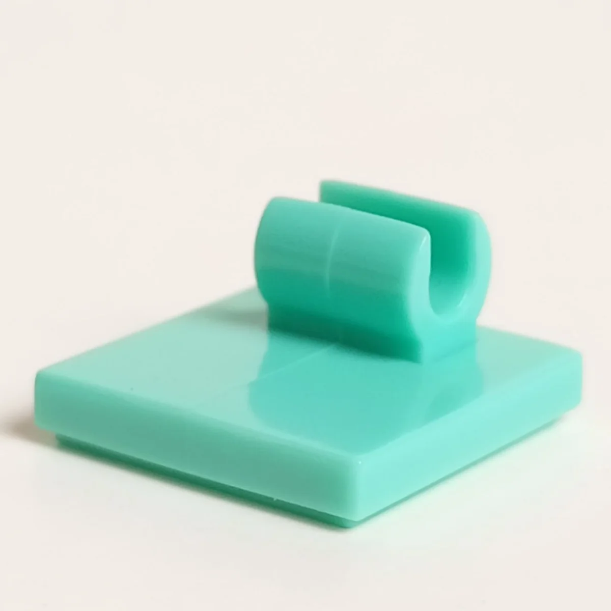 Tile 2 x 2 with top-mounted horizontal clip, offset in Teal