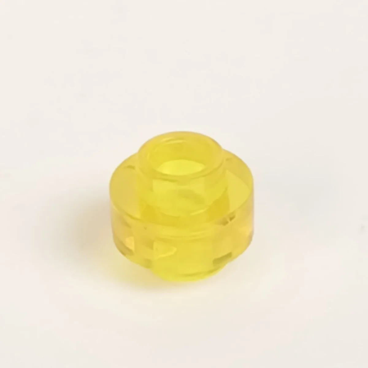 Plate Round 1 x 1, Double Sided with Open Top in Yellow (Translucent)