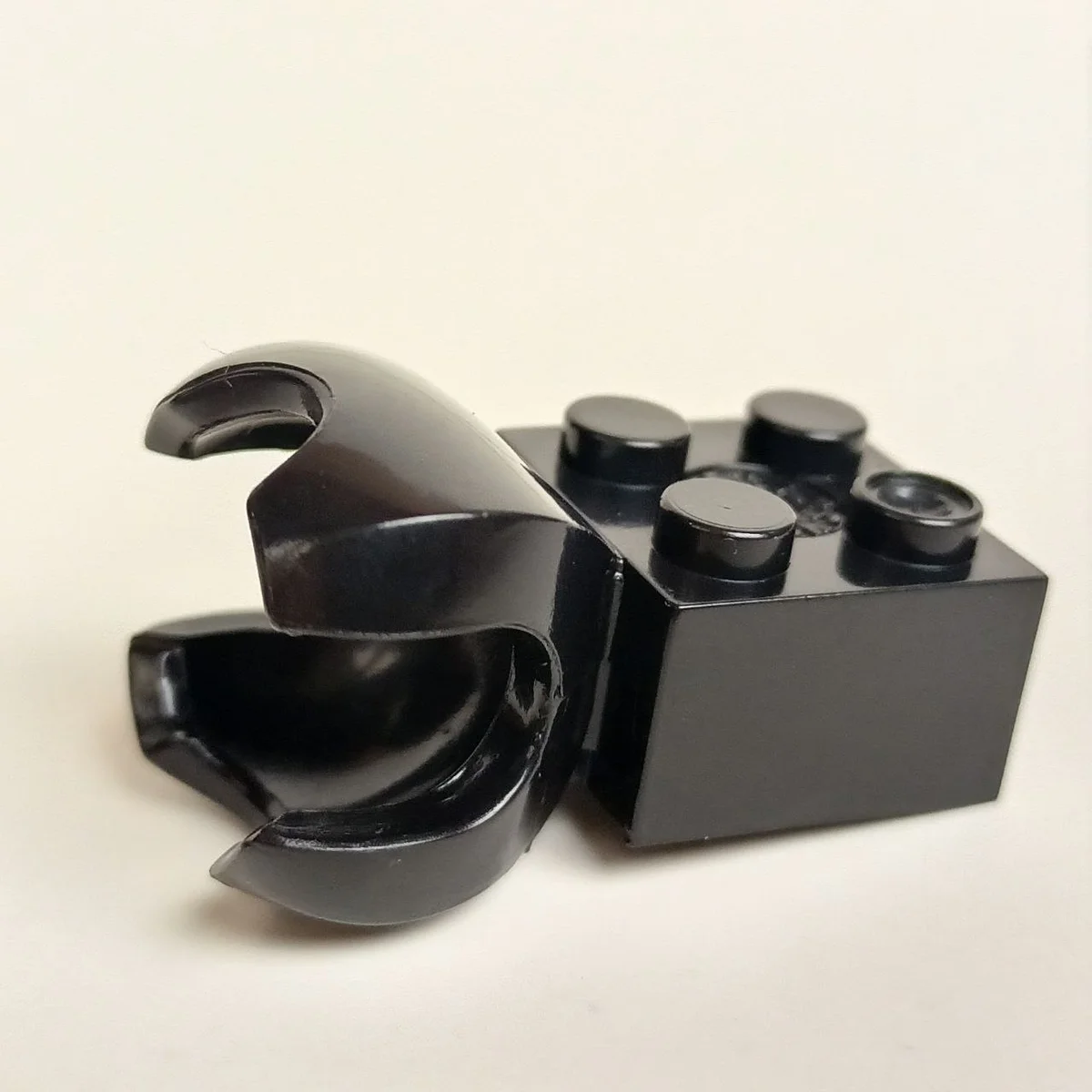 Brick 2 x 2 with ball joint socket, large in Black
