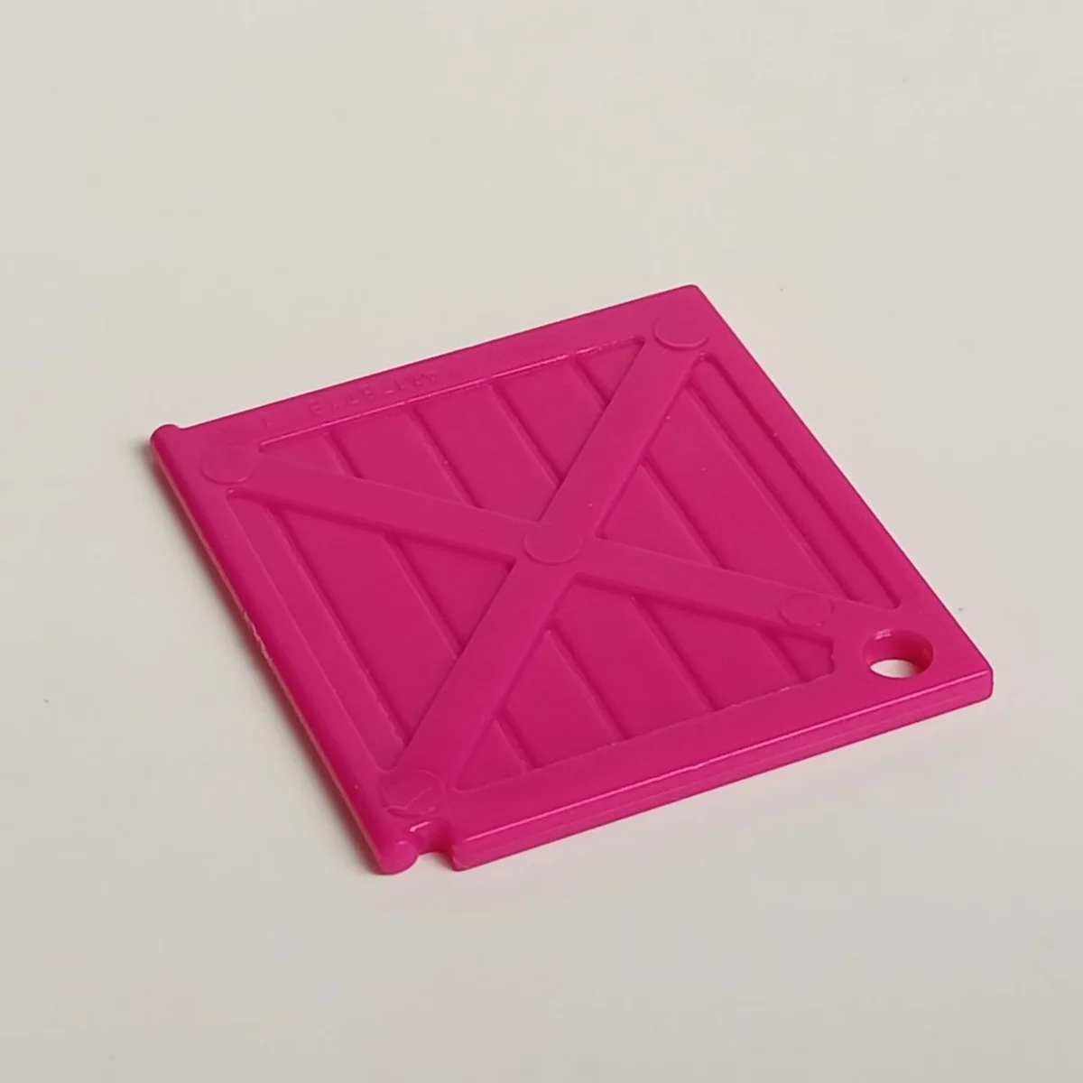 lower half of the door, with crossed out planks in Pink, Barbie
