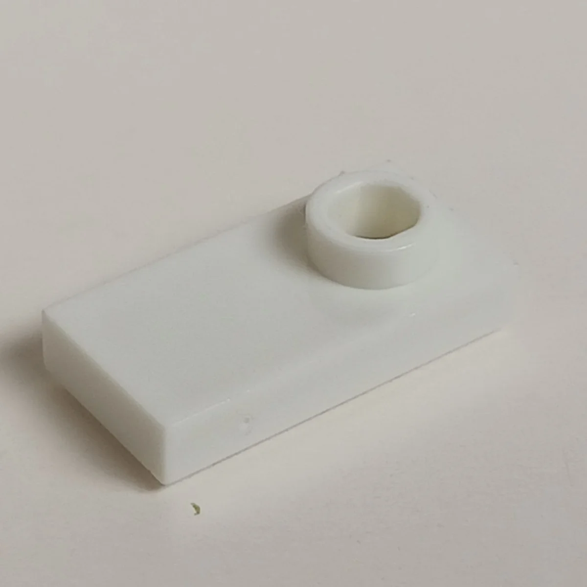 Plate Modified 1 x 2 with one stud, offset in White
