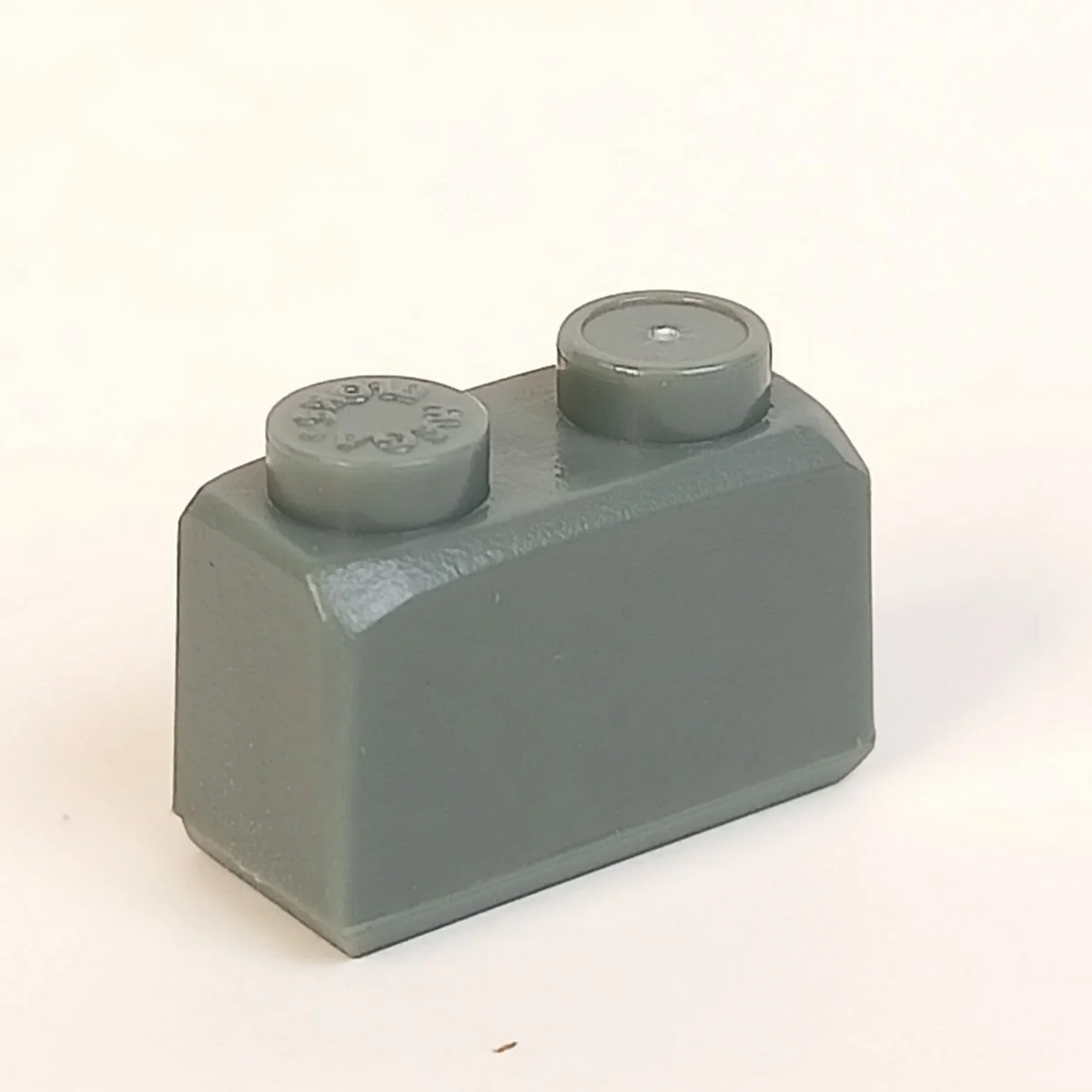 Brick 1 x 2 stone in Gray, Dark