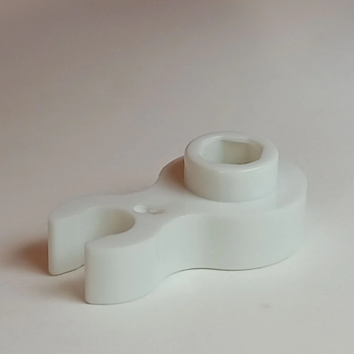 Plate Modified 1 x 1 round with vertical clip in White