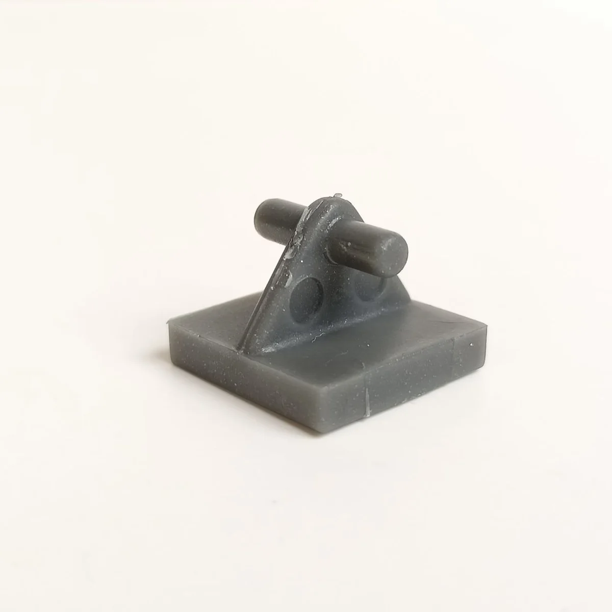 Tile 2 x 2 with raised horizontal bar, type 01 in Gray, Dark (Metallic)