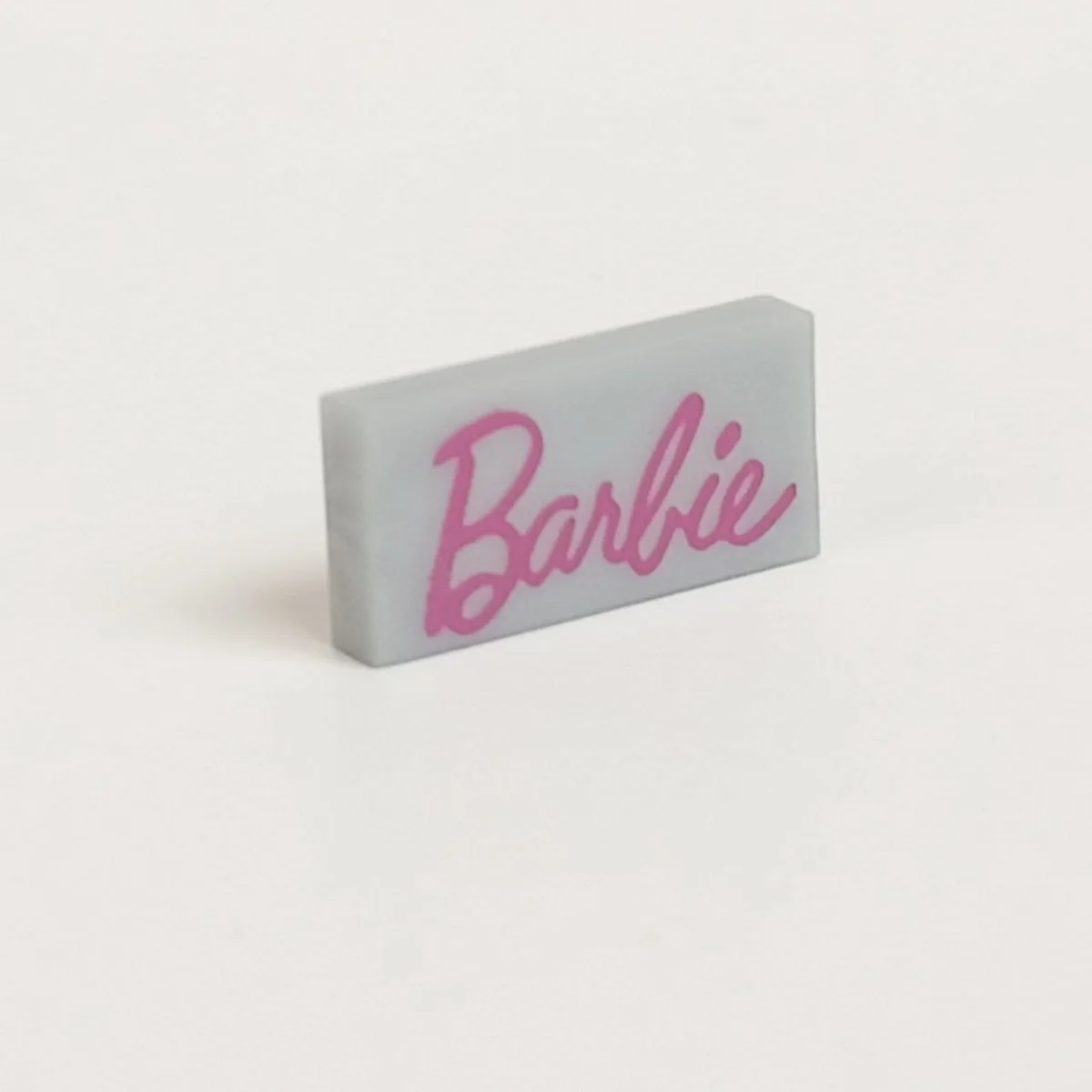 1 x 2 tile with barbie pink "BARBIE" pattern in Gray, Steel