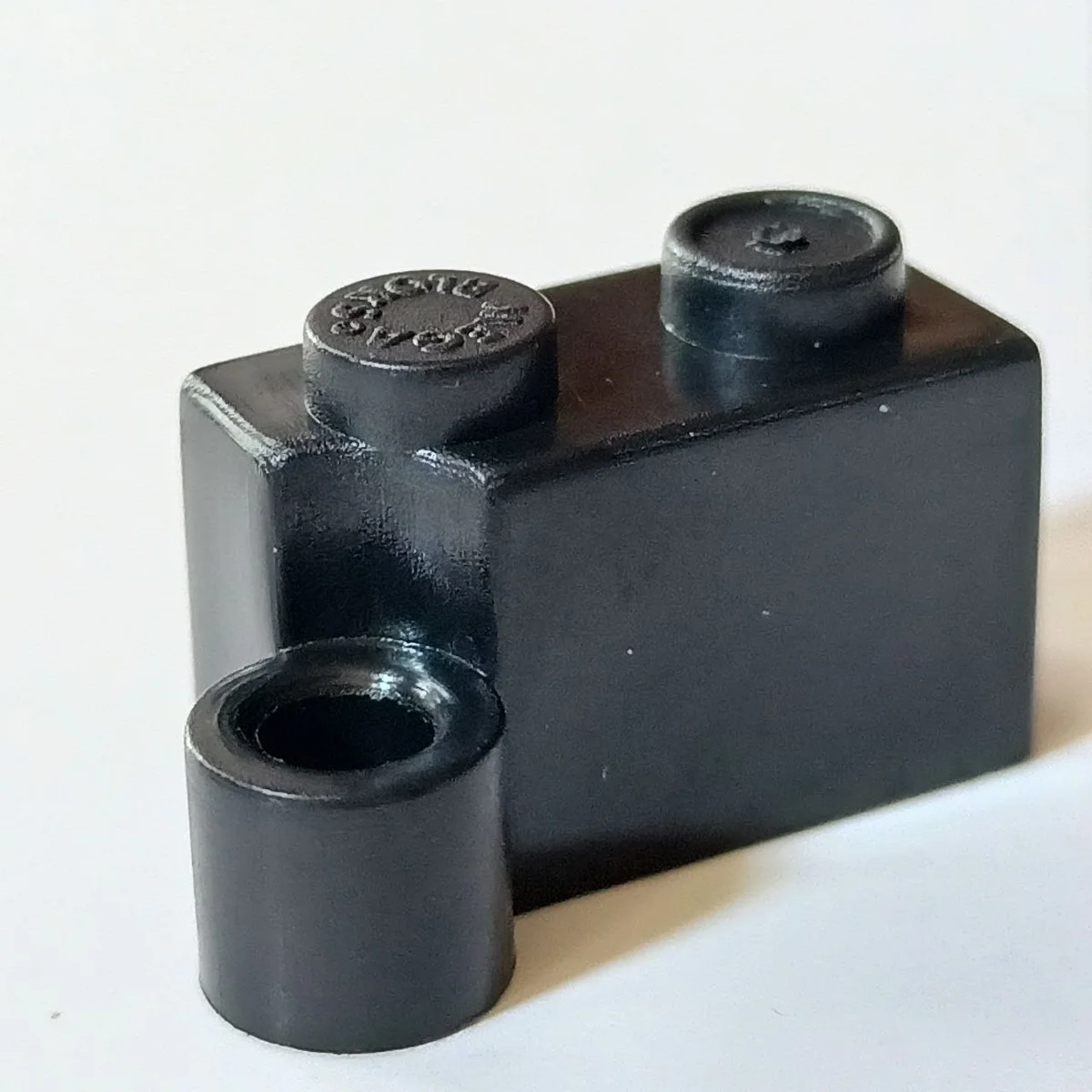 Hinge brick 1 x 4, bottom in Black