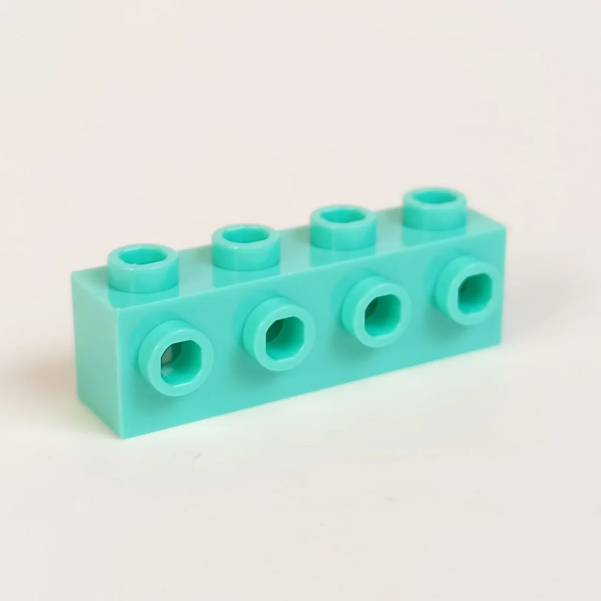 Brick Modified 1 x 4 with side studs in Teal