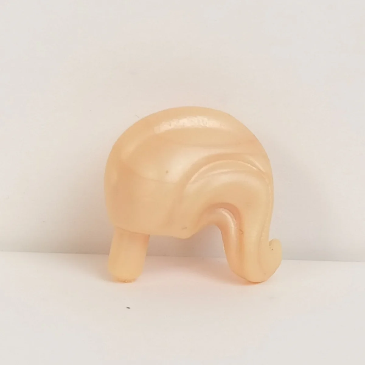 Short wavy ponytail with bar peg