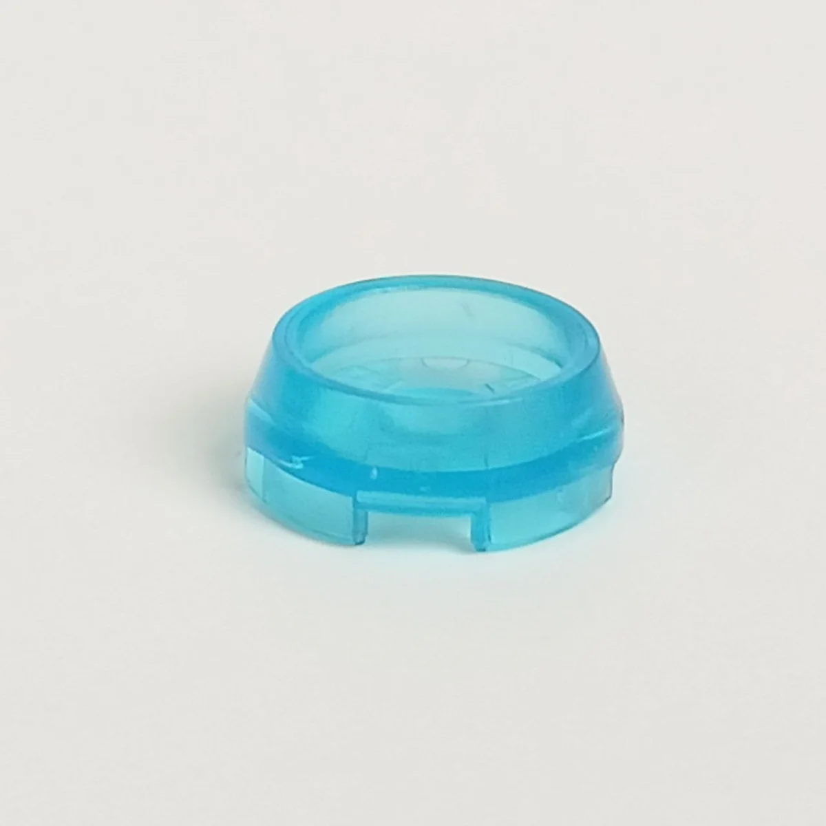 Brick Round 2 x 2 two-thirds height with recessed center in Blue, Medium (Translucent)