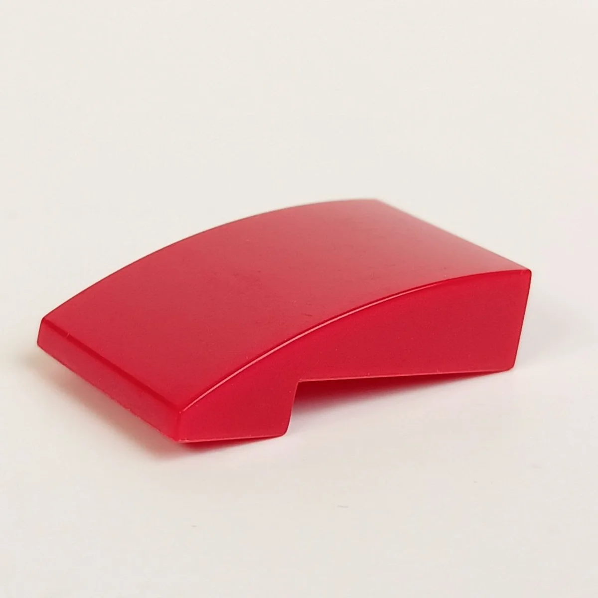 Slope brick 33 2 x 3 curved slope in Red, Flame