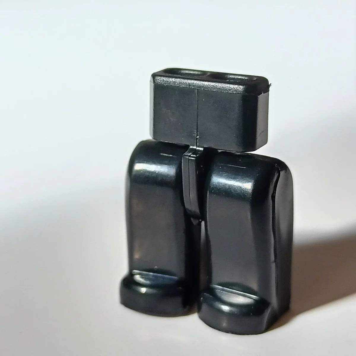 Figure, legs: black in Black