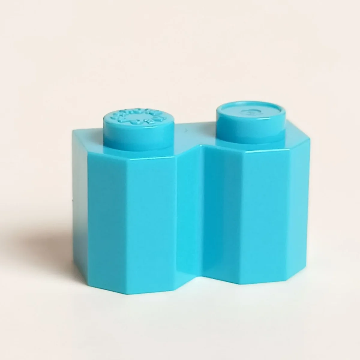 Brick 1 x 2 with vertical cutout and six notches in Blue, Rich Sky