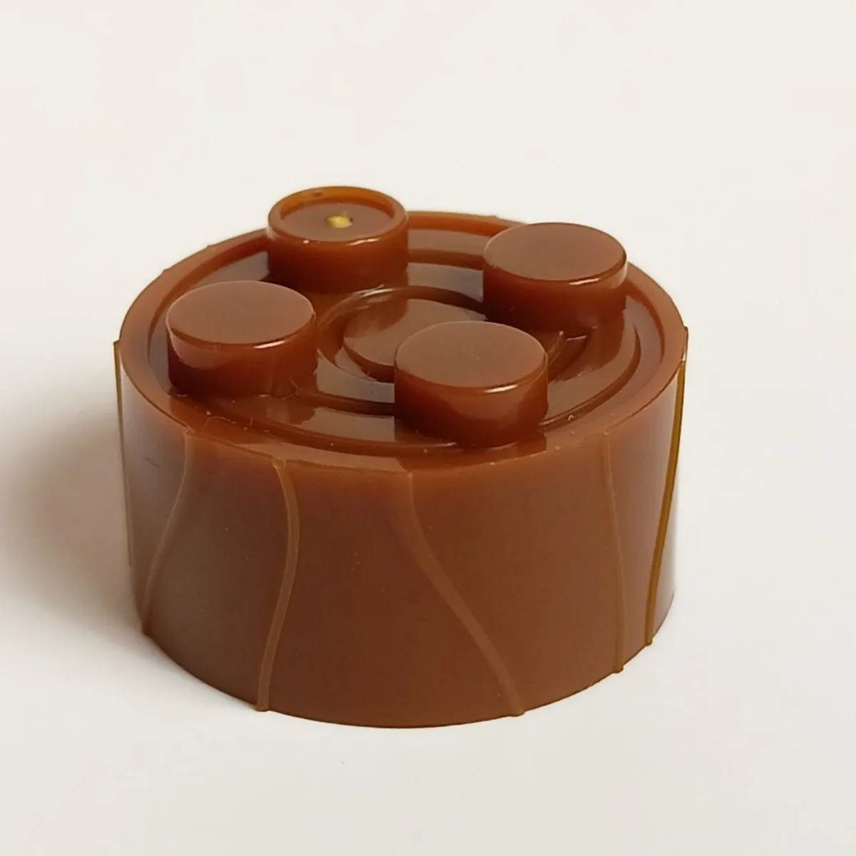 Brick 2 x 2 round with textured sides in Brown, Rich