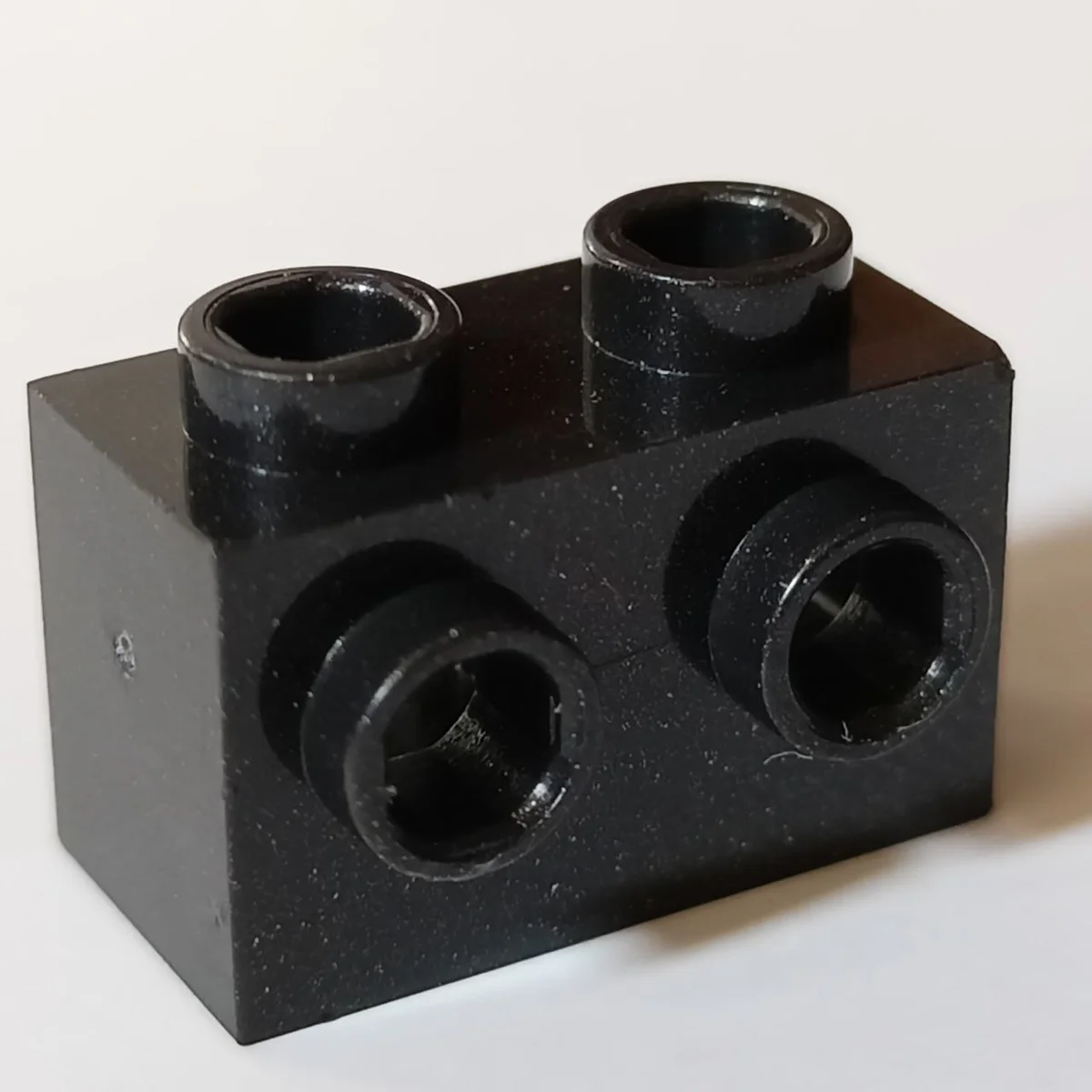 Brick Modified 1 x 2 with side studs in Metal, Gunmetal (Metallic)