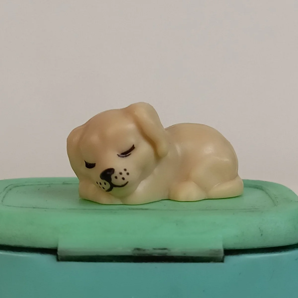 Puppy, sleeping, peg hole on the back of the head (tan fur color)