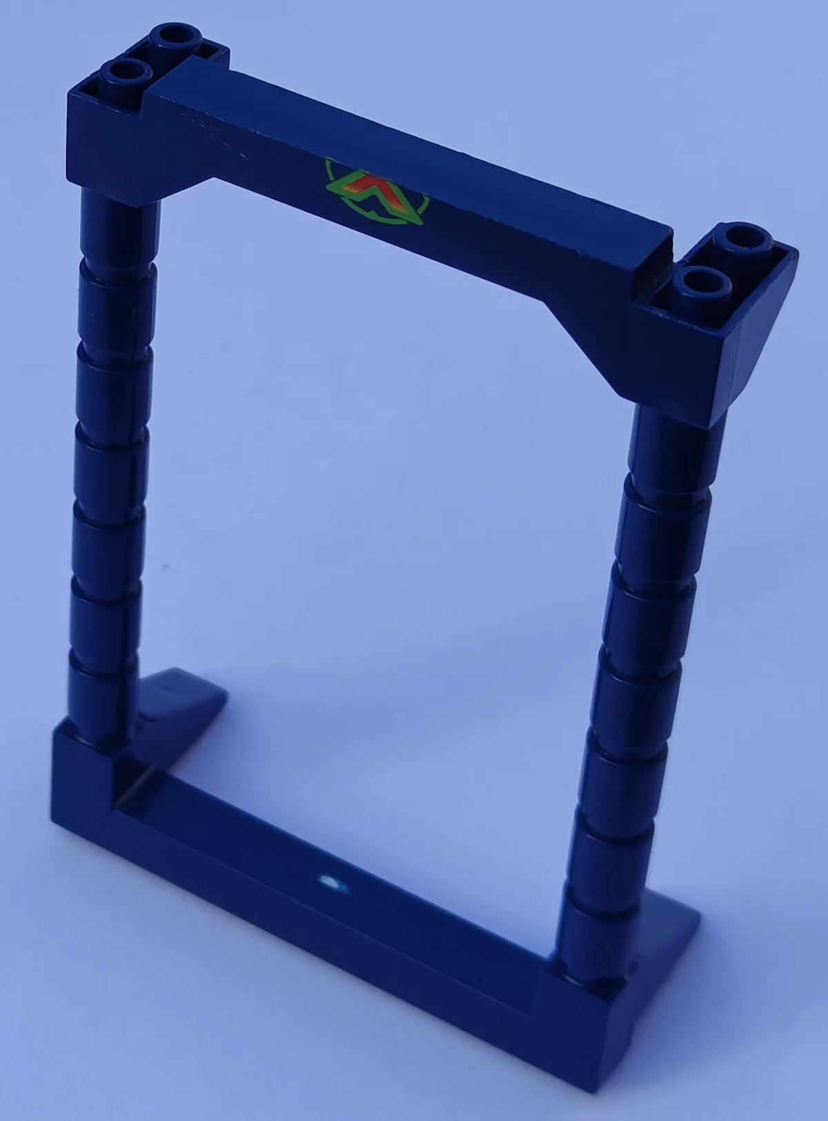 Wall 8 x 8 x 3 twin cylindrical columns w/ base of ''X'' logo in Blue, Steel