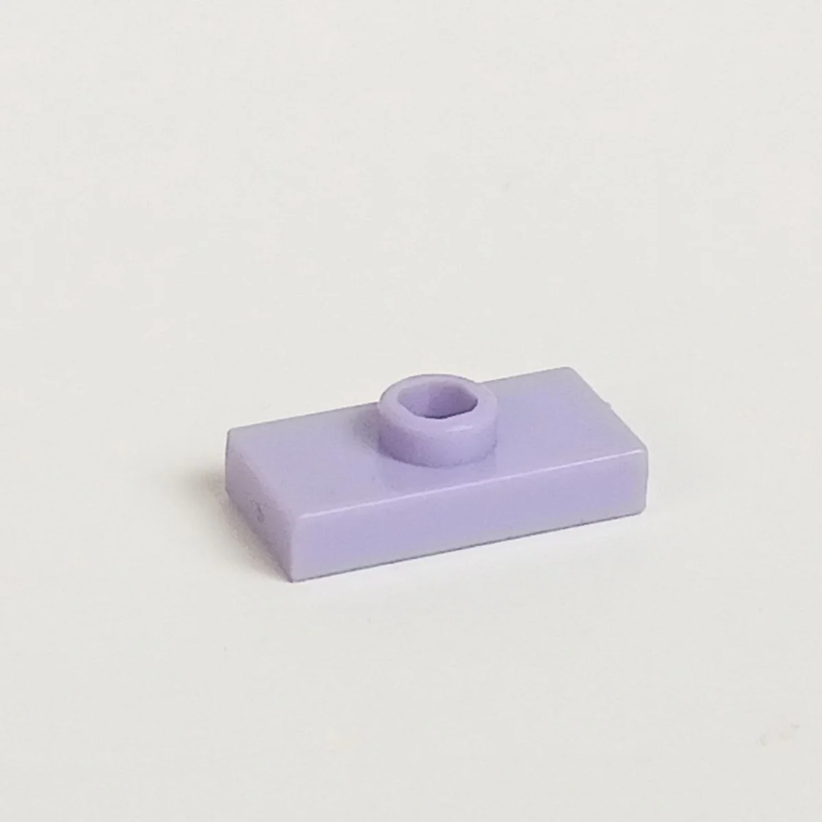 Plate Modified 1 x 2 with one stud, center