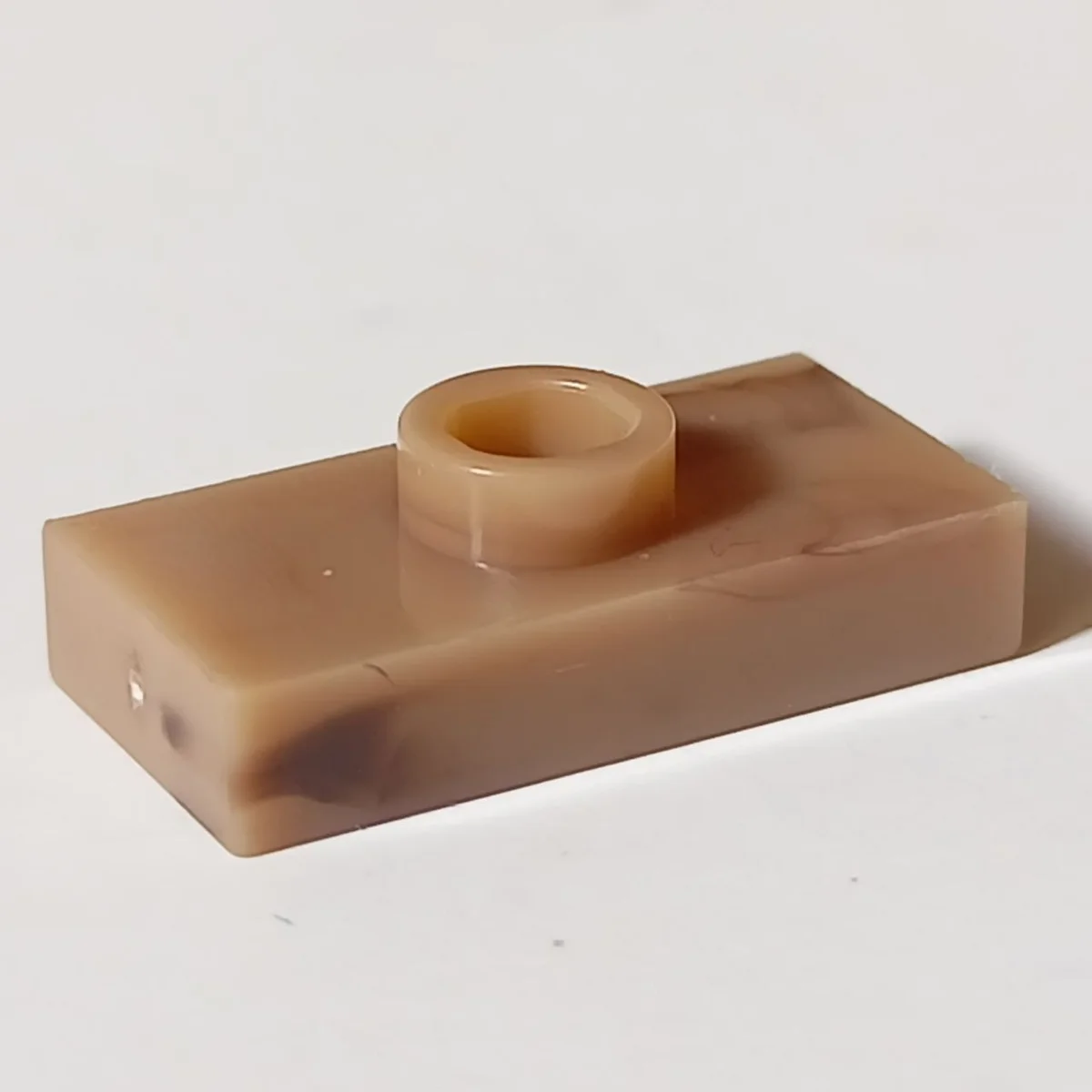 Plate Modified 1 x 2 with one stud, center