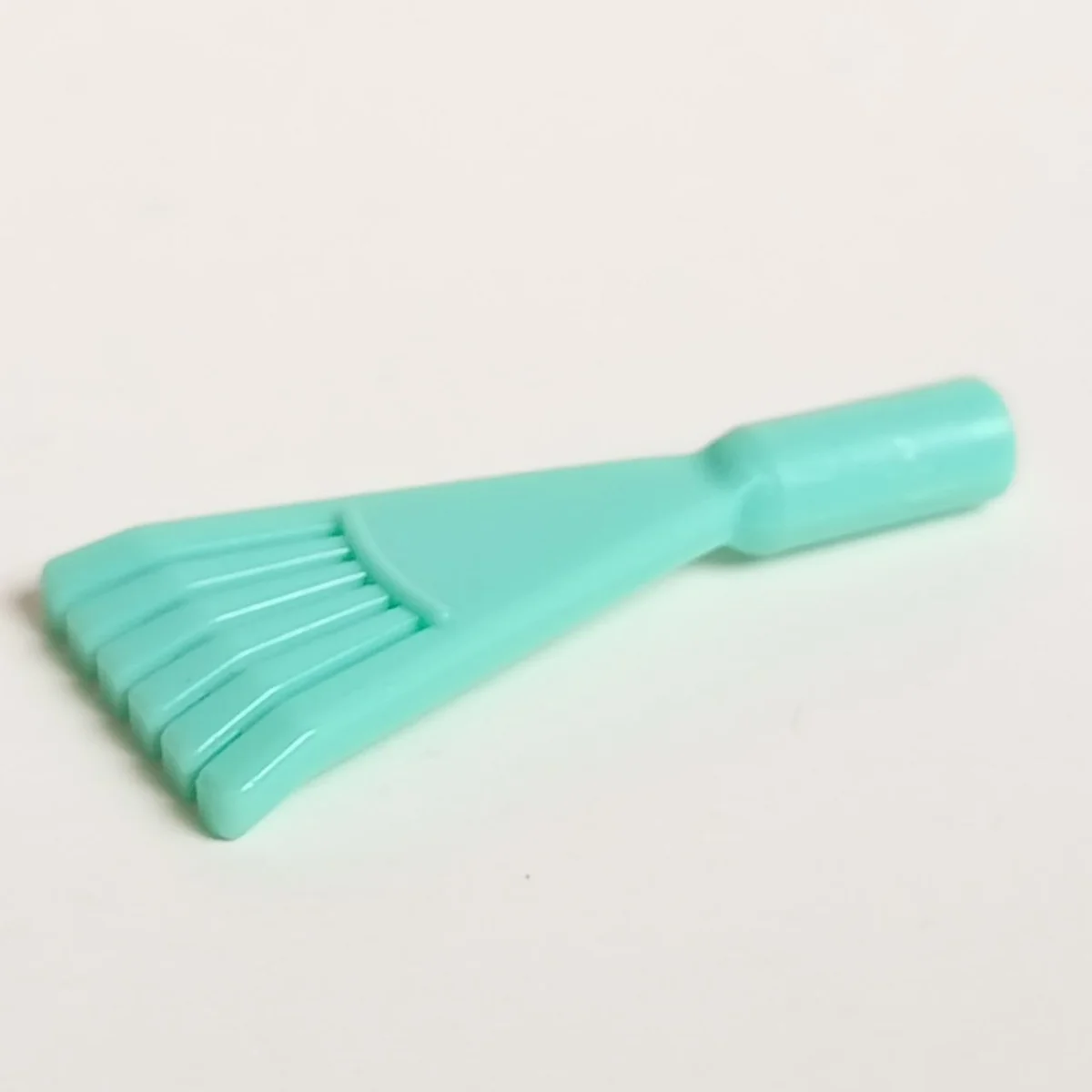 Tool: hand rake in Teal