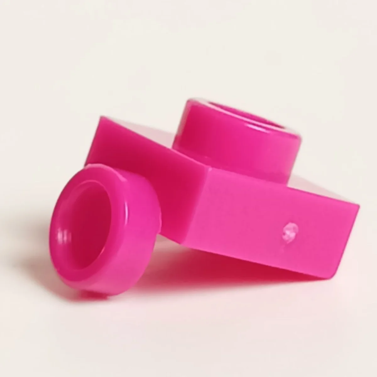 Bracket 1 x 1 with one stud on side, descending in Pink, Barbie