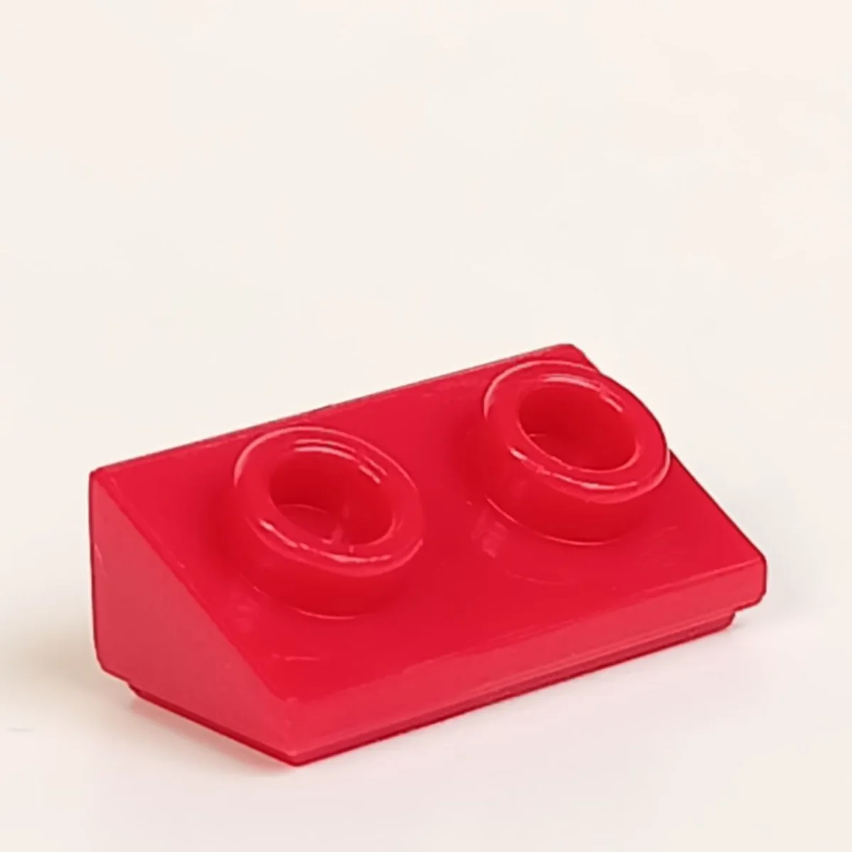 Slope brick 36 2 x 1 with open studs on slope in Red, Flame