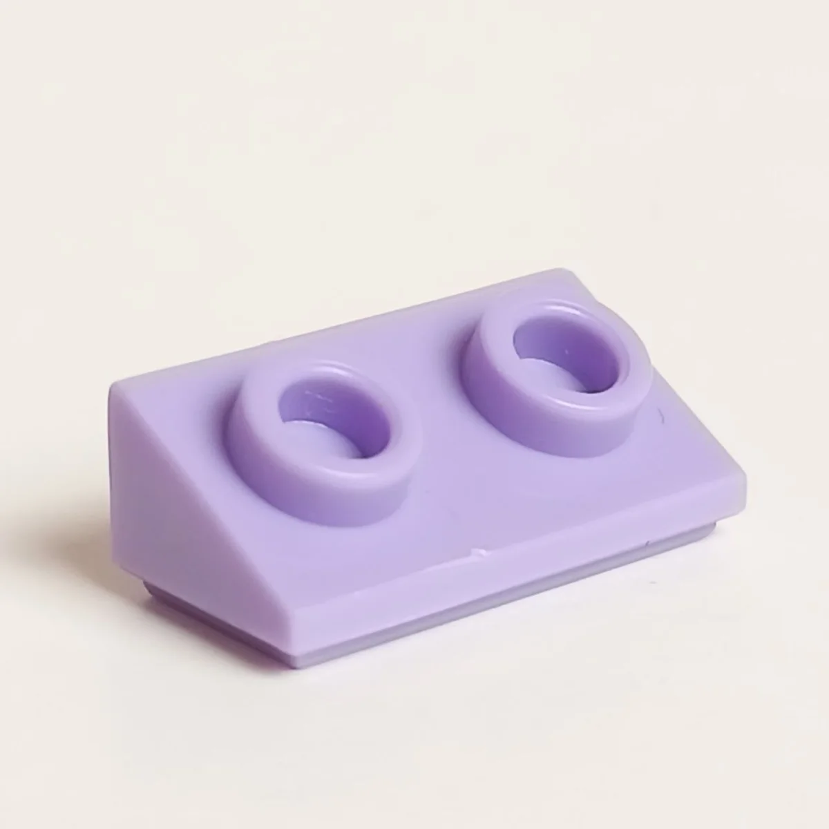Slope brick 36 2 x 1 with open studs on slope in Purple, Lavender