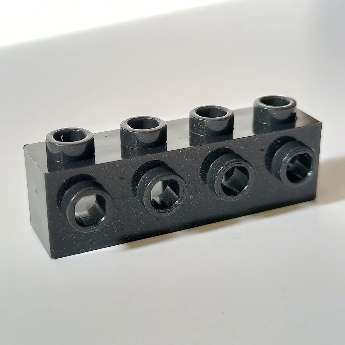 Brick Modified 1 x 4 with side studs in Metal, Gunmetal (Metallic)
