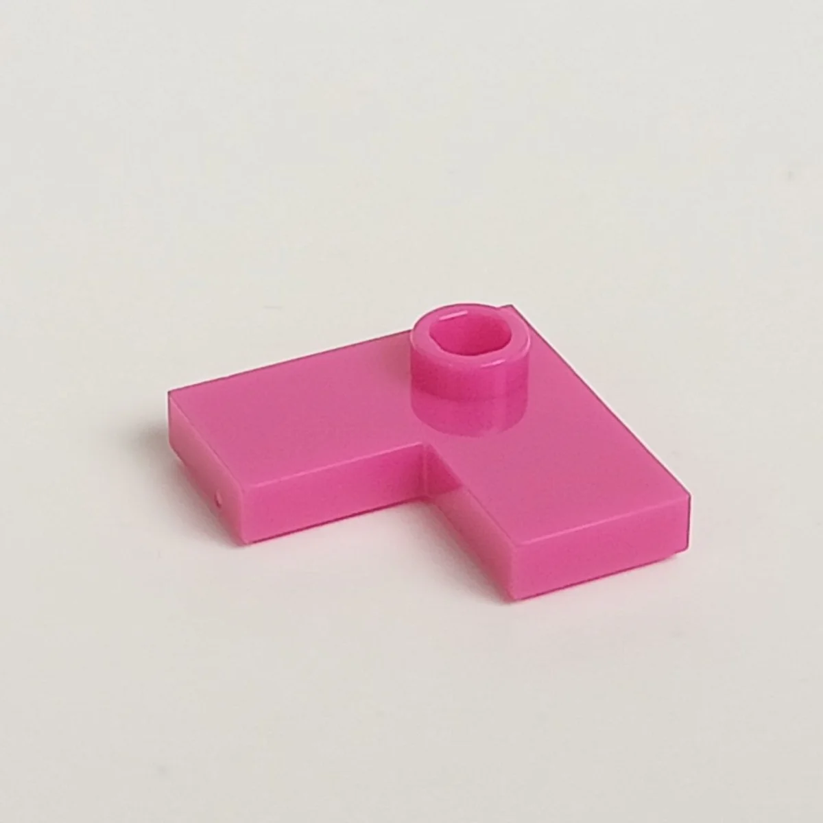 Plate 2 x 2 corner with one stud, center in Pink, Barbie