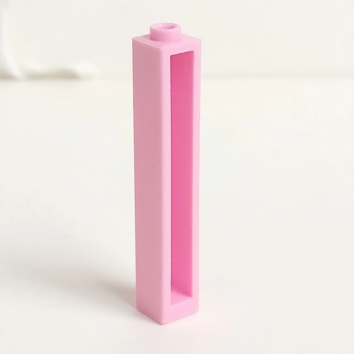 Brick 1 x 5 x 1 with open back in Pink, Rose