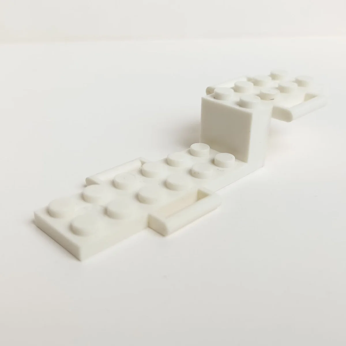 2 x 10 Vehicle base (6 stud long lower base with handles and 4 stud long upper half with handles) in White