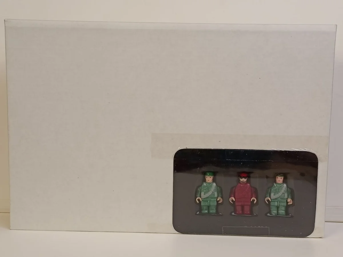 Inner box with taped on 3 figure plastic case (Command Ops Laptop Recovery)
