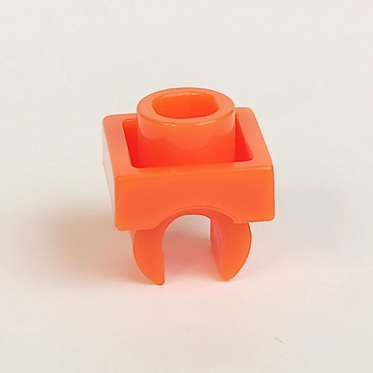 Plate Modified 1 x 1 with underside clip in Orange, Bright