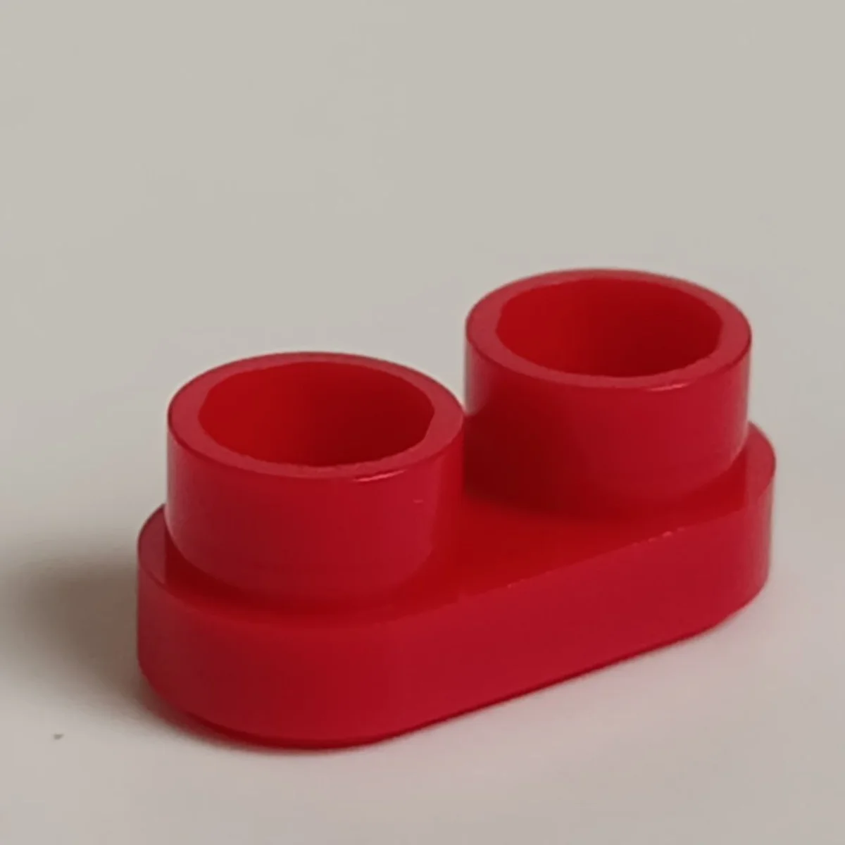 Plate 1 x 2 Connector: female:female, type 01 in Red, Cardinal