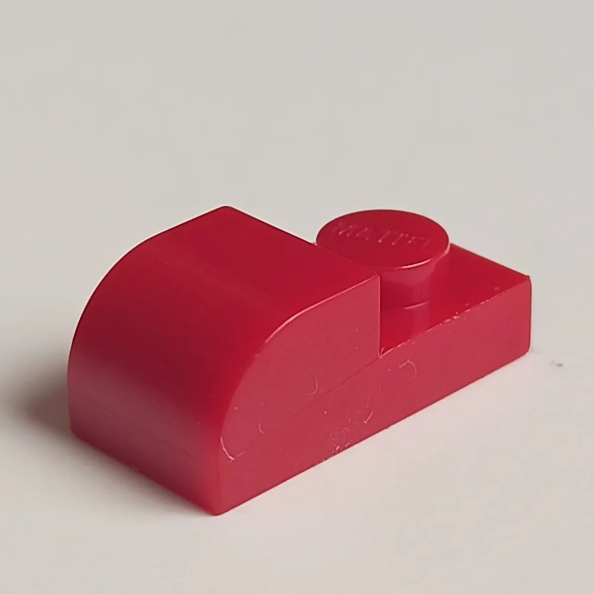 Plate 1 x 2 with half-round slope in Red, Flame