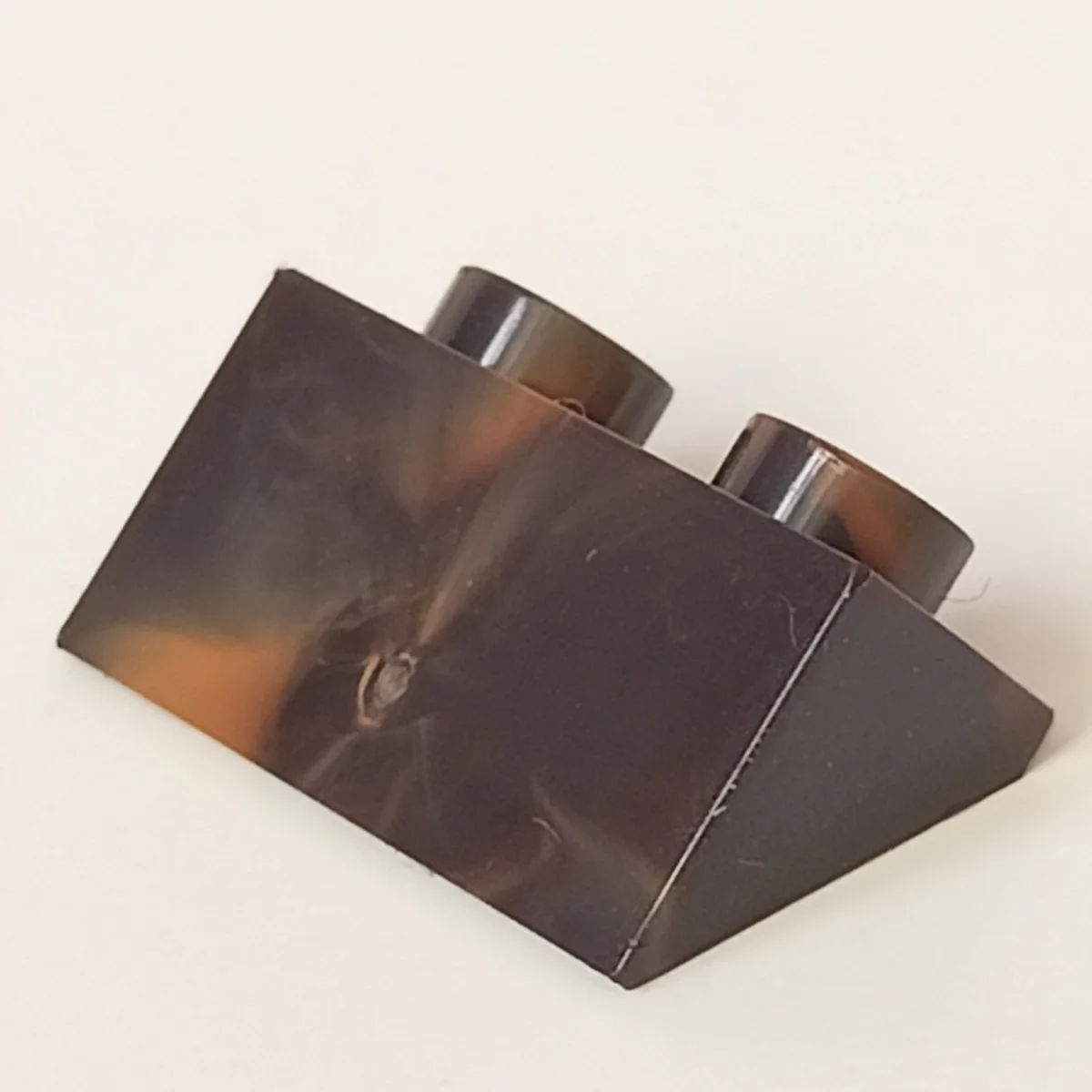 Slope brick 45 2 x 1 inverse in Brown, Zinnwaldite